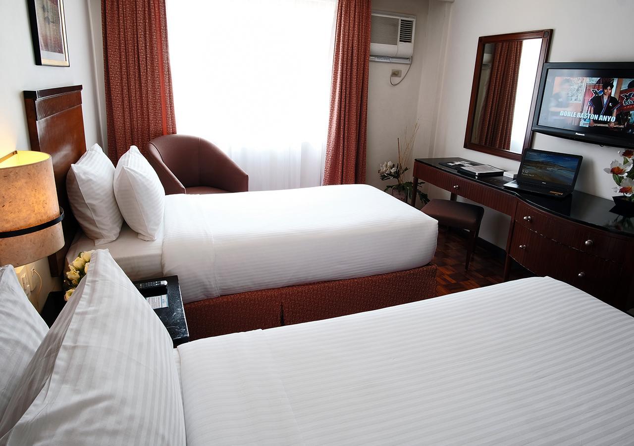 Fersal Hotel Neptune Makati Макати Экстерьер фото