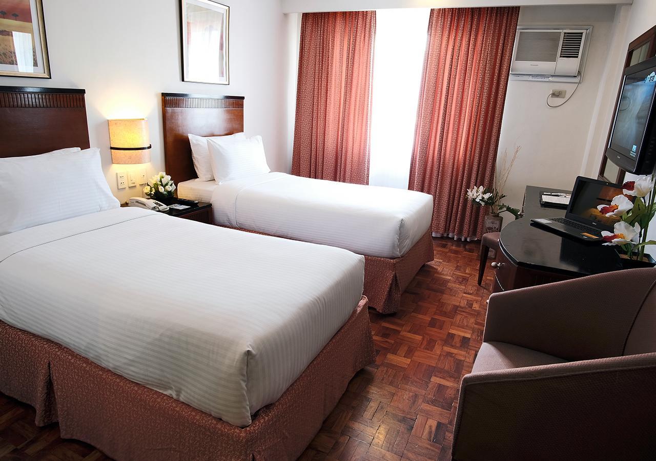 Fersal Hotel Neptune Makati Макати Экстерьер фото